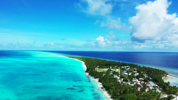 Aerial drone view seascape of relaxing lagoon beach holiday by blue sea and bright sandy background 
