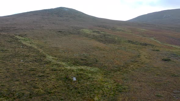 Aerial View of Cnoc an Stualaire Next to the Glenveagh National Park  County Donegal Ireland