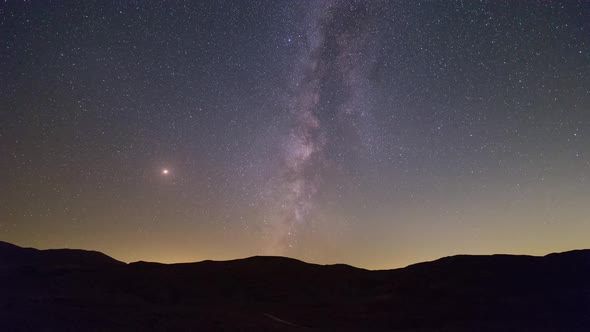 On the meteor shower night, in the narute. Somewhere far from city and light pollution.