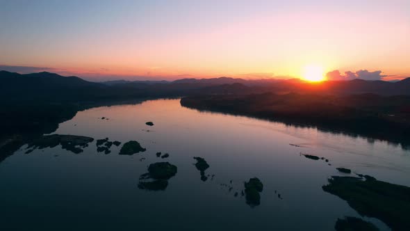 4K Flight Through Landscape River. Sunset landscape