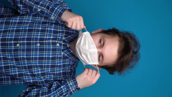 Boy Feeling Sick and Wearing Mask