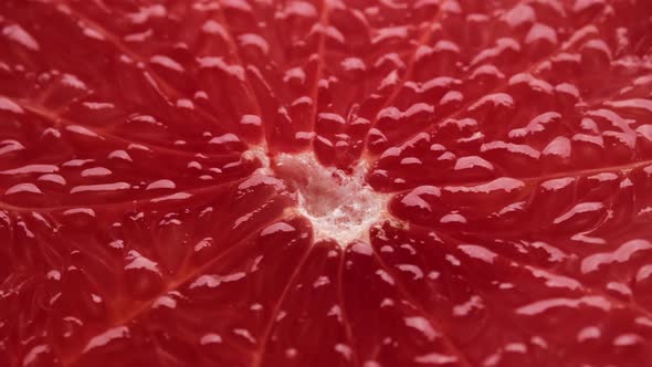 juicy red grapefruit macro shot, rotate. healthy food concept
