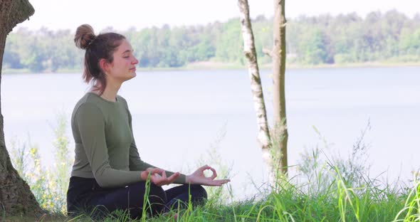 Closeup Shots of a Young Woman Practicing Yoga in Nature