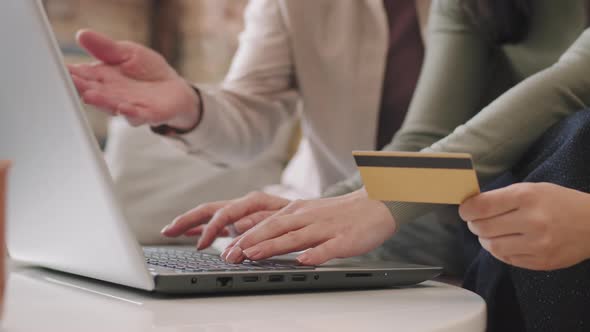 Women Doing Online Shopping Via Laptop