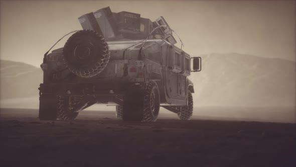 Military Patrol Car on Sunset in Desert Storm