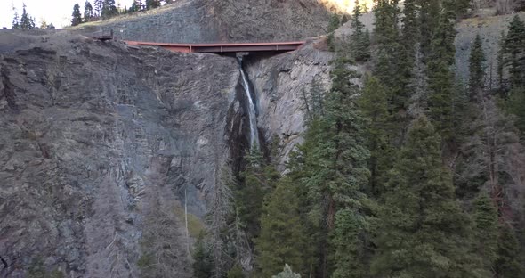 Bear Creek Falls in Ouray, Colorado along the Million Dollar Highway with drone videoing forward.