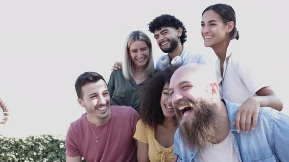 Group of Happy Multiracial People Having Fun Together Outdoors