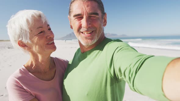 Senior Caucasian couple enjoying time at the beach