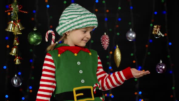 Kid Girl in Christmas Elf Santa Helper Costume Dancing Fooling Around