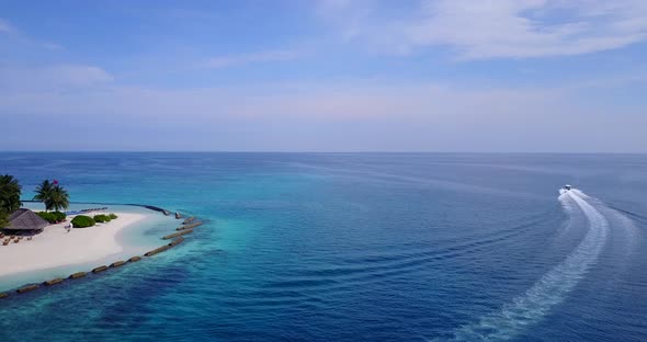 Beautiful overhead copy space shot of a sunshine white sandy paradise beach and aqua blue water back