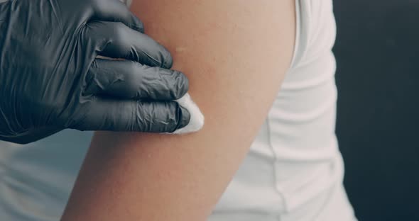 Vaccination of a Teenager in the Shoulder