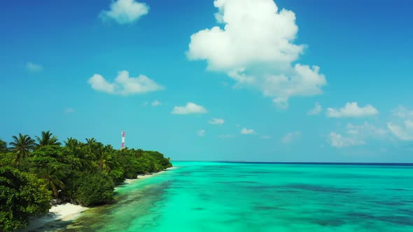 Aerial drone shot tourism of perfect lagoon beach voyage by blue green lagoon and white sandy backgr