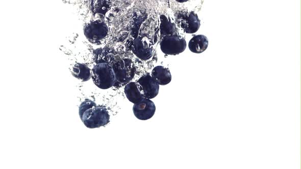 The Super Slow Motion of Blueberries Falls Under the Water with Air Bubbles