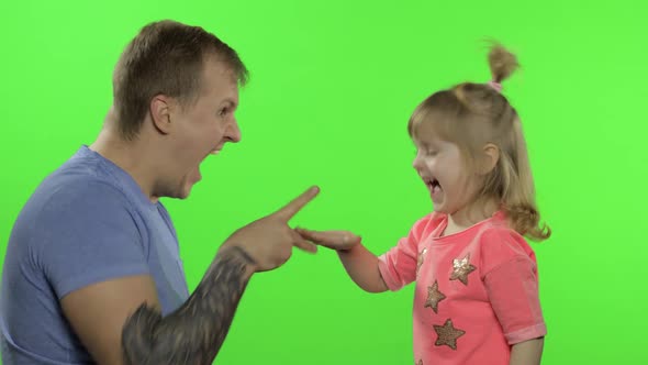 Father and Little Daughter Playing Rock Paper Scissors. Chroma Key. Leisure Game