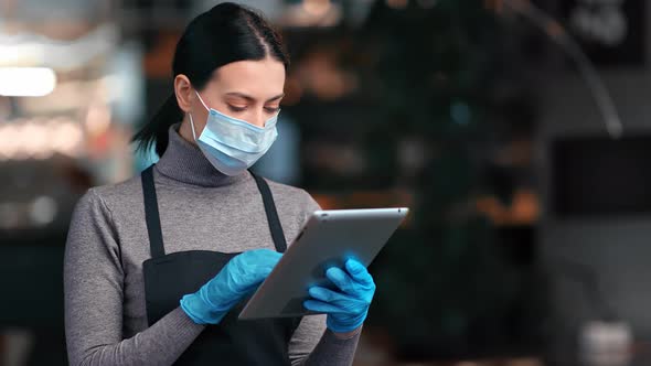 Busy Female in Protective Mask Work Digital Tablet Menu