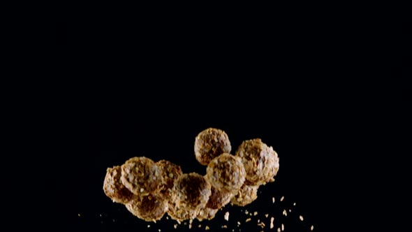 Flying and Falling Luxury Delicious Truffle Balls with Crushed Almonds Slow Mo