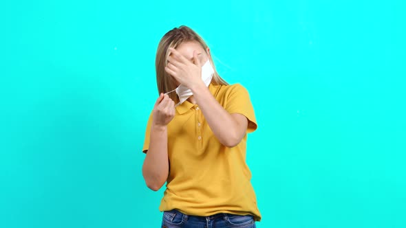 The Young Woman Wearing a Surgical Mask on Her Face Due To the Pandemic