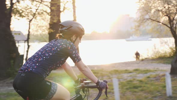 Female is riding bicycle