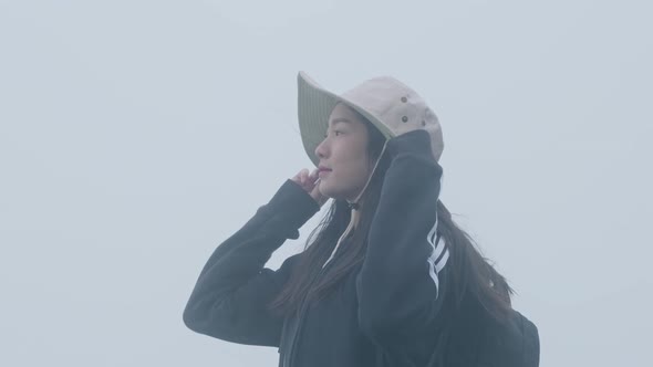 Young female tourist enjoying the view and the beautiful .