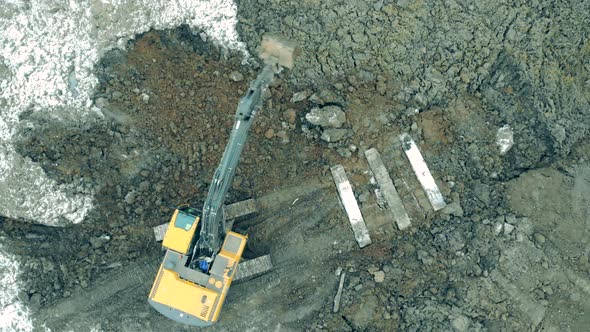 Construction Excavator Work at the Industrial Quarry