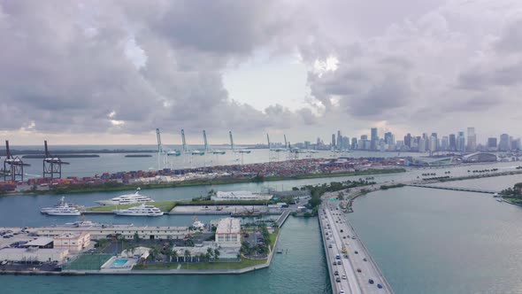  Drone View on Traffic on Highway Bridge Over Miami Bay Harbor, Florida, USA alt