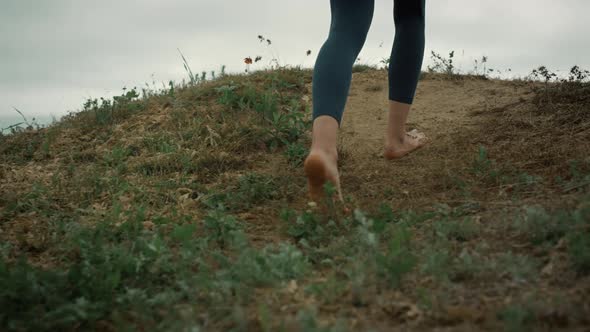 Athletic Woman Legs Walking Up Hill Close Up