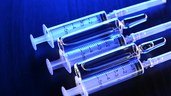 Medical Syringes and Ampoules with Vaccine for Injection