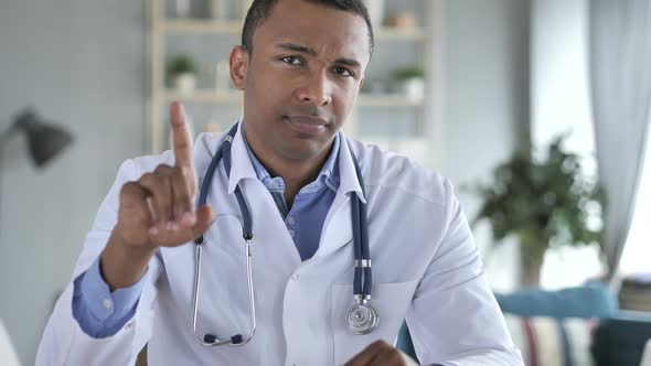 No, Rejecting African-American Doctor Waving Finger