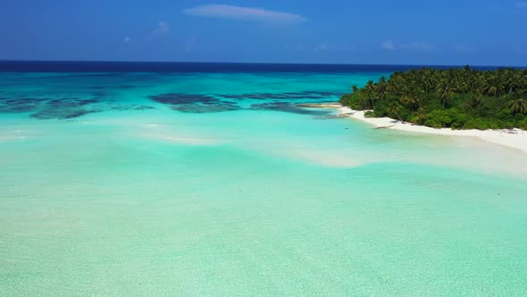 Aerial top view panorama of beautiful coastline beach wildlife by clear lagoon with white sandy back