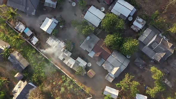 Top View Of Houses in Gerupuk Fisher Village, South Lombok, Indonesia - Drone Ascend