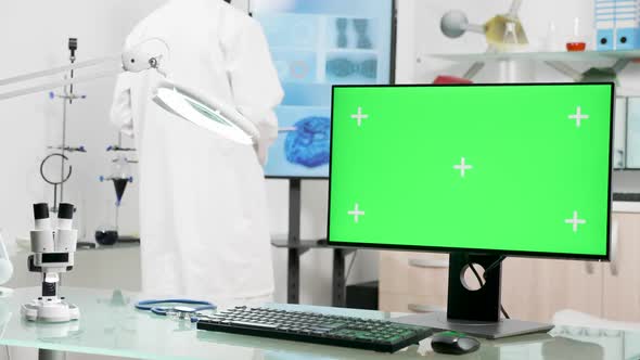 Zoom in Shot on Green Screen Monitor in Modern Laboratory