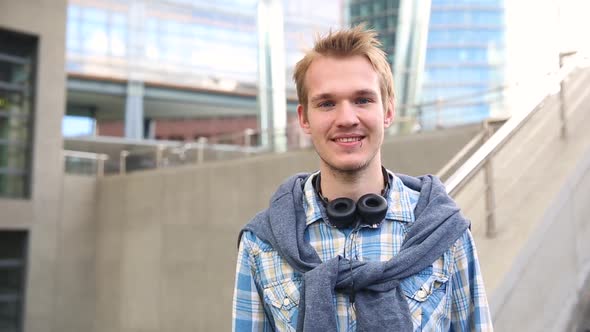 Young man portrait in the city