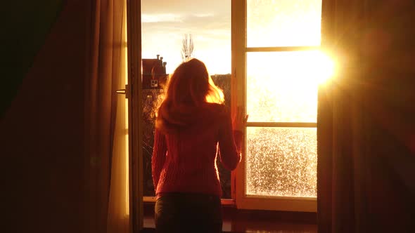 Girl Opening A Window And Looking At The Evening City 4