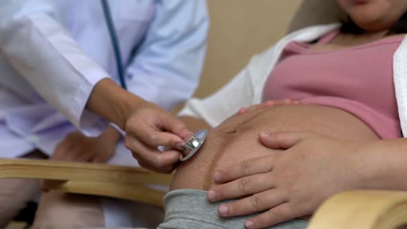 Pregnant Woman and Gynecologist Doctor at Hospital