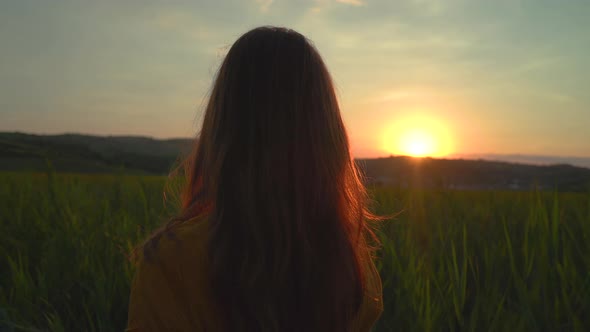 Evening view of a woman walking