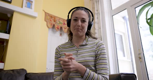 Woman working from home having a remote meeting on a video call