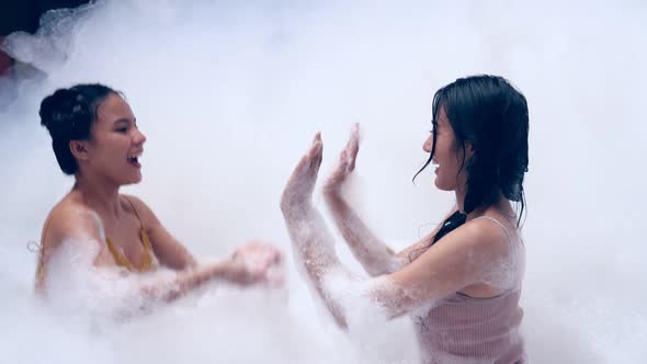 Girl Playing in Bubble Pool with Fun and Joy