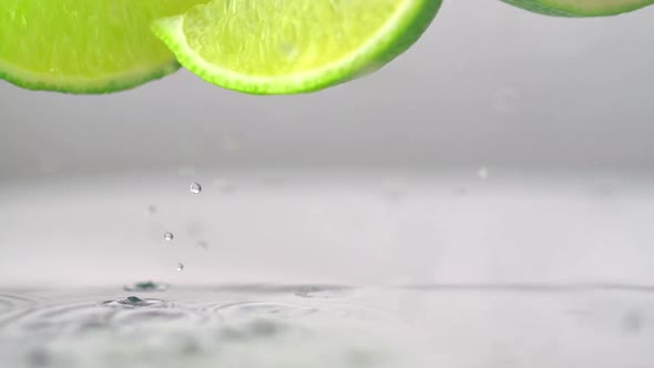 Close-up three whole limes, Slow Motion
