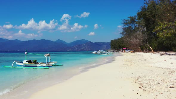 Wide angle overhead travel shot of a summer white paradise sand beach and blue sea background in col