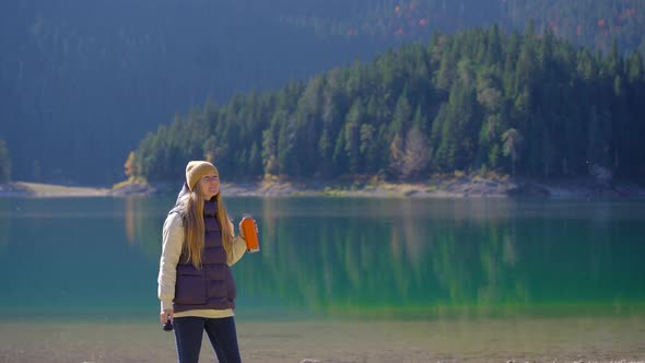A Young Woman Visits the Crno Jezero or the Black Lake Near the City of Zabljak