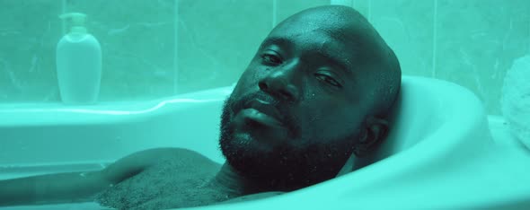 Portrait of African American Man in Bath