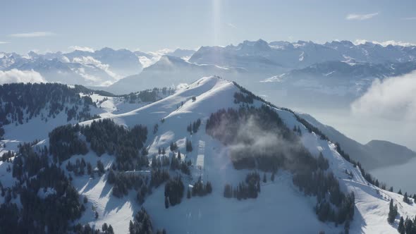 Aerial view of mountain peak in wintertime, Lucerne, Switzerland.