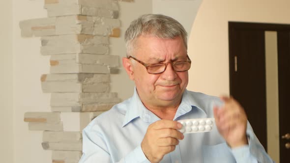 Grandpa Reads the Instructions on the Tablets, but He Does Not See His Poor Eyesight