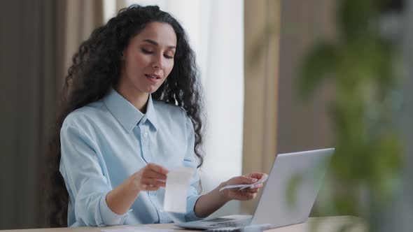 Focused Business Woman Hispanic Accountant Managing Personal Monthly Budget Check Money in Computer