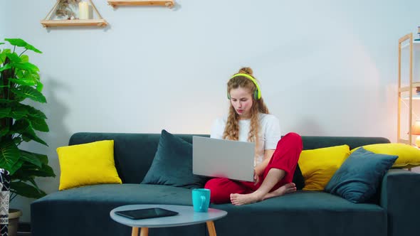 Young Woman Student Doing Her Course Online on the