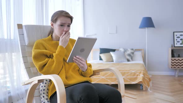 Tense Frustrated Woman Reaction, while Using Tablet