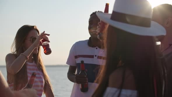 Young People Partying on Beach