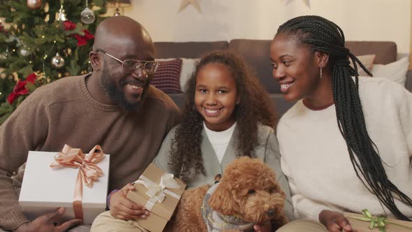 Portrait of Happy African-American Family at Christmas