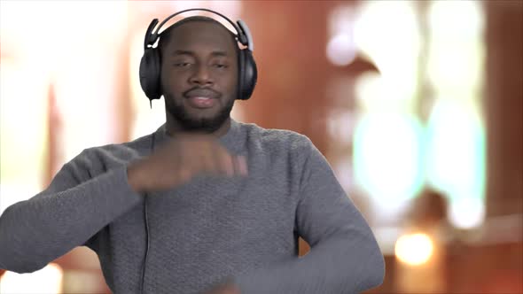 Energetic Man Listening To Music in Headphones.