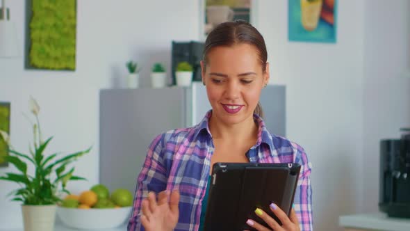 Closeup of Woman Using Tablet